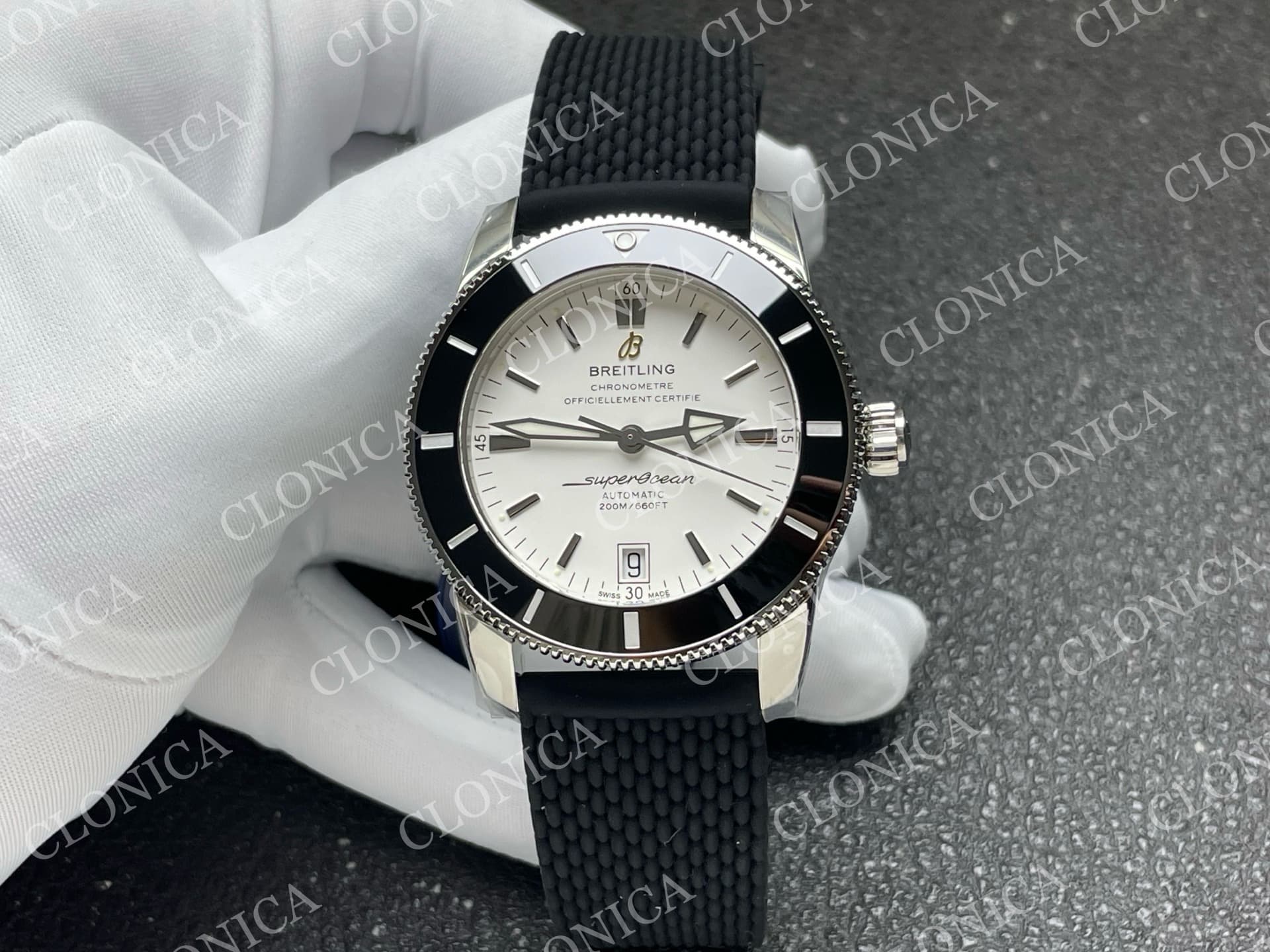 SUPEROCEAN 42MM AB2010 SS WHITE DIAL BLACK CERAMIC BEZEL ON BLACK RUBBER STRAP A2824 — view 1