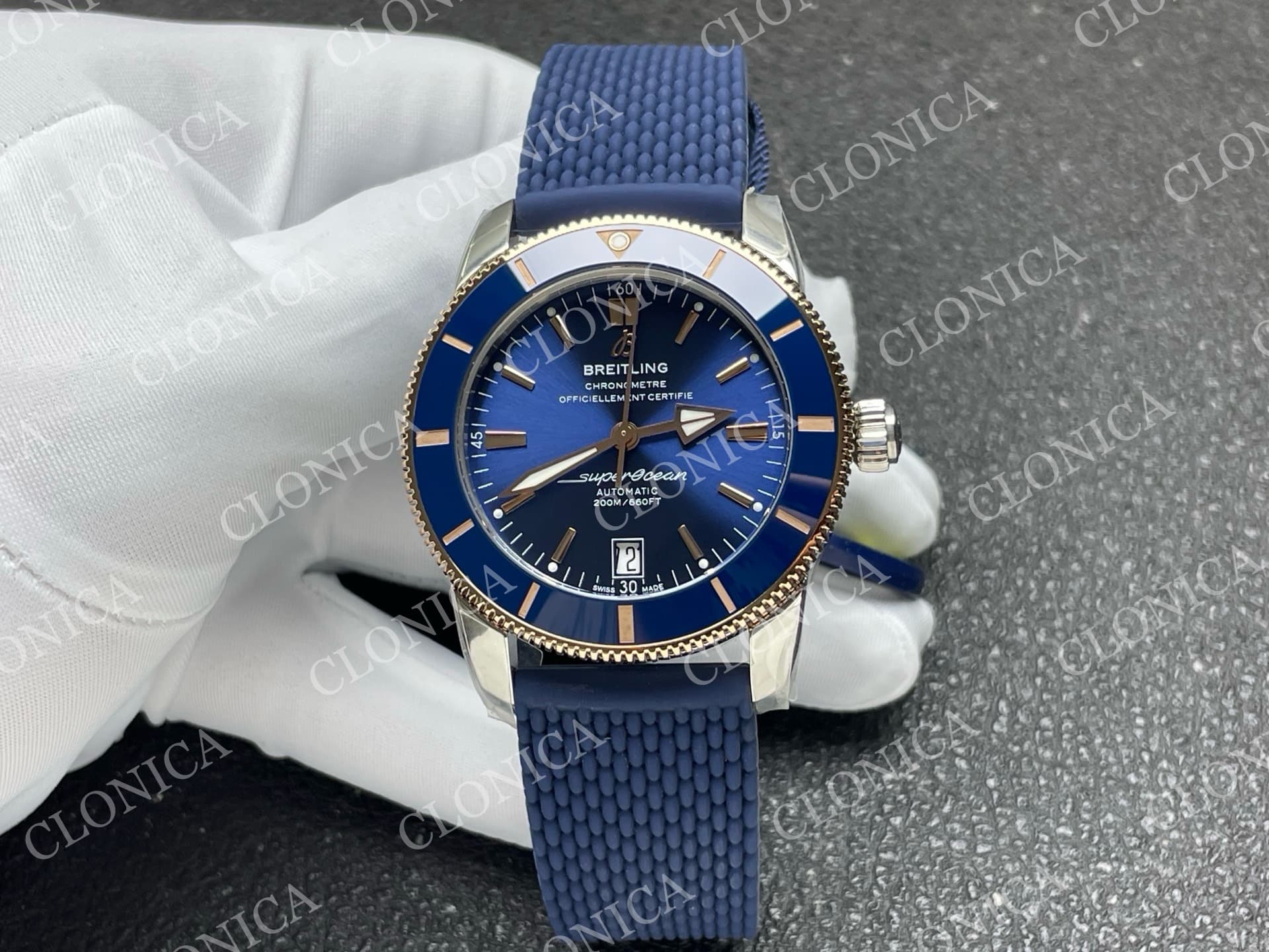SUPEROCEAN 42MM AB2010 SS/RG BLUE DIAL BLUE CERAMIC BEZEL ON BLUE RUBBER STRAP A2824 — view 1