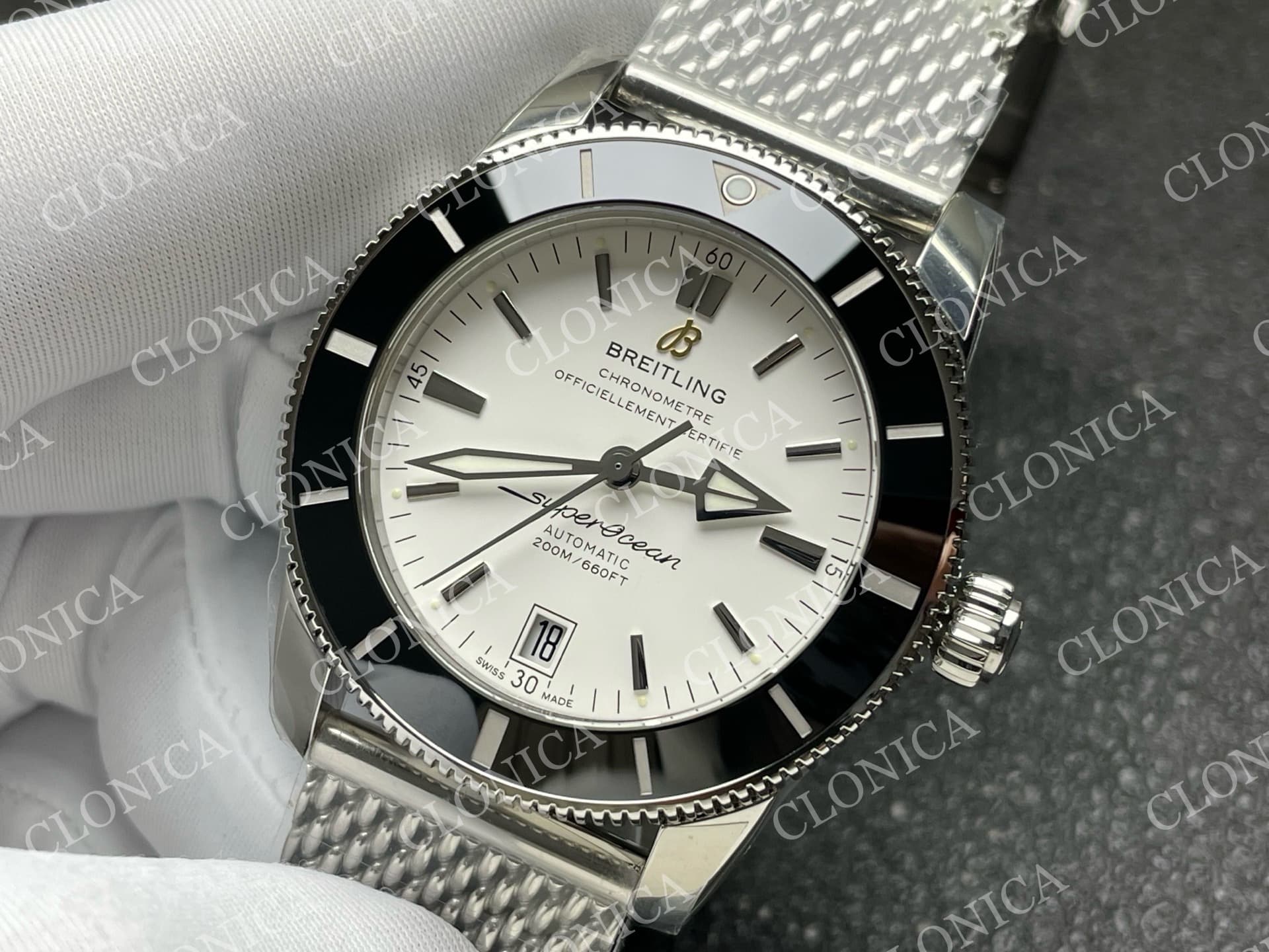 SUPEROCEAN 42MM AB2010 SS WHITE DIAL BLACK CERAMIC BEZEL ON SS BRACELET A2824 — view 4