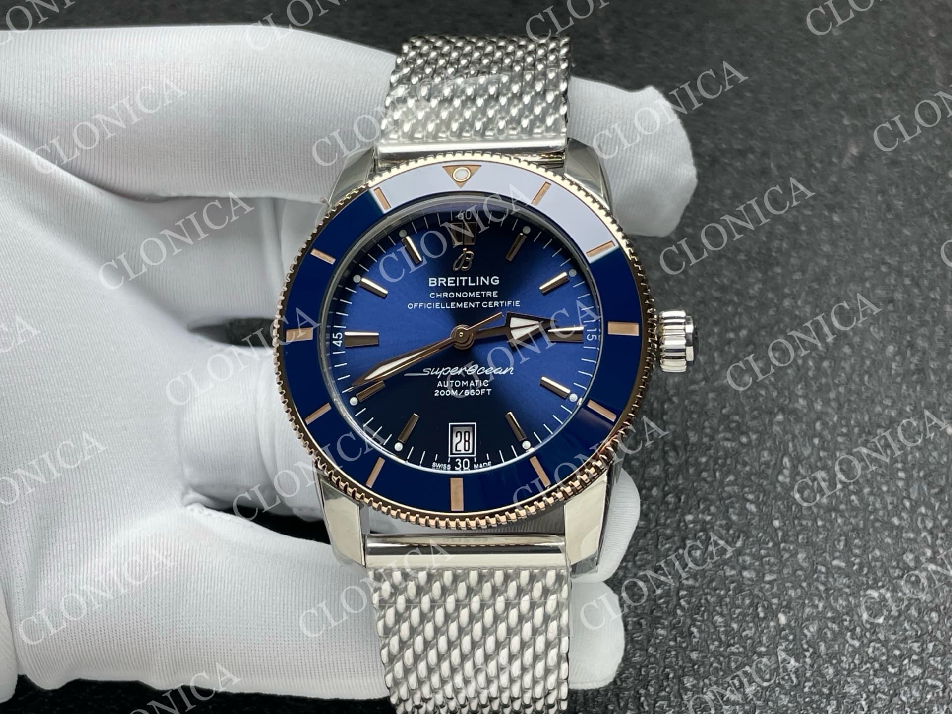 SUPEROCEAN 42MM AB2010 SS / RG BLUE DIAL BLUE CERAMIC BEZEL ON SS BRACELET A2824 — view 1