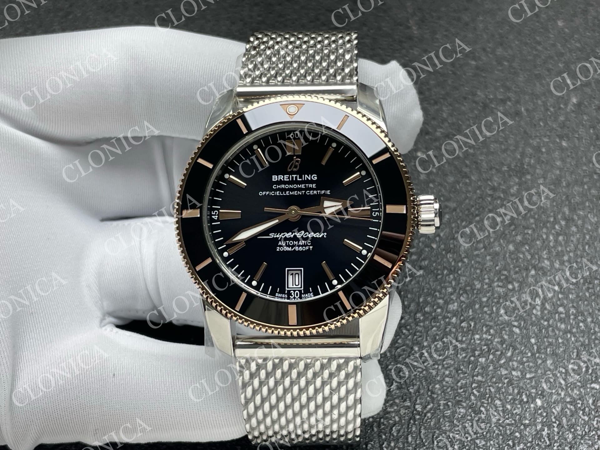 SUPEROCEAN 42MM AB2010 SS / RG BLACK DIAL BLACK CERAMIC BEZEL ON SS BRACELET A2824 — view 1