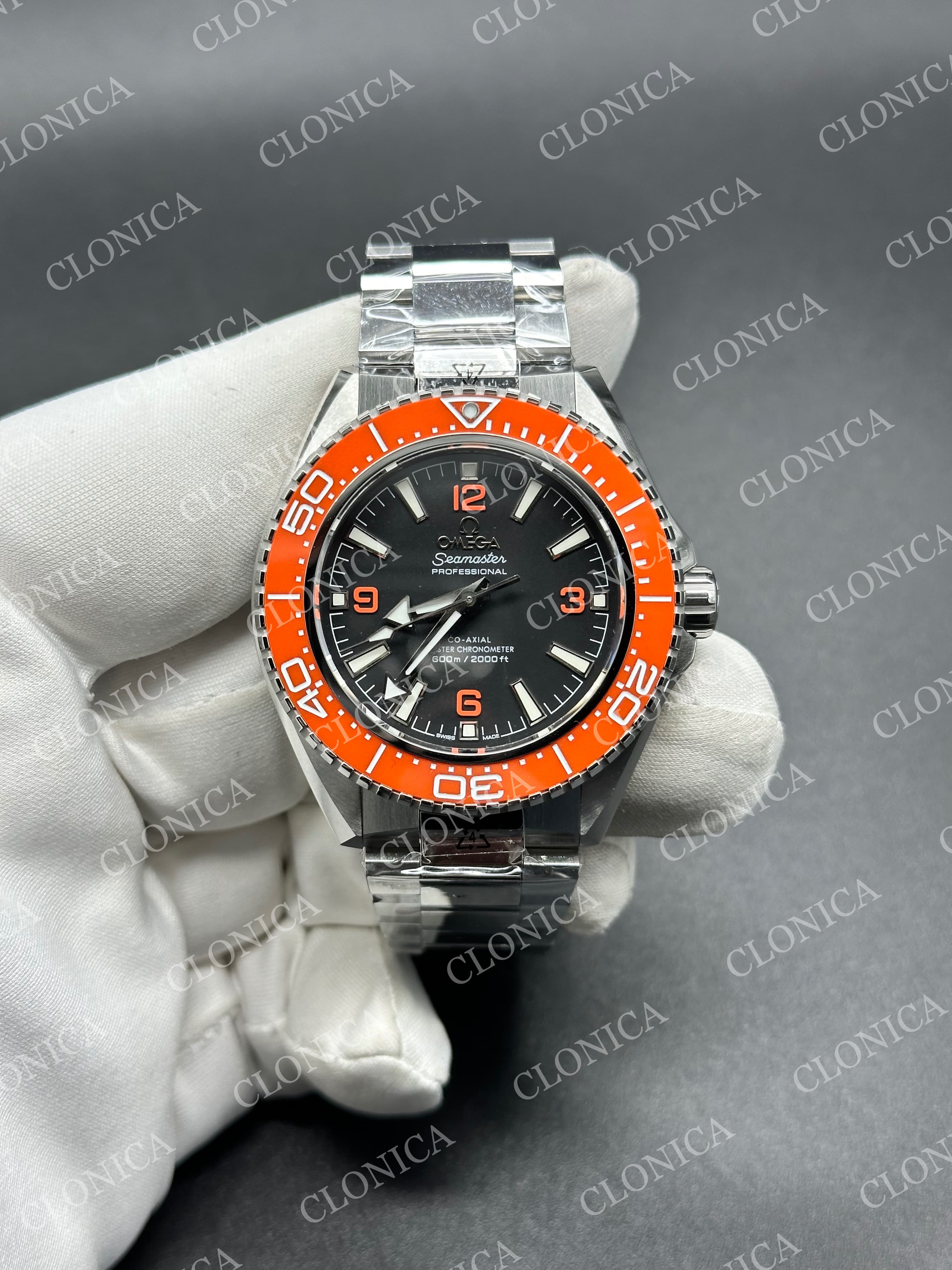SEAMASTER 6000M PLANET OCEAN SS BLACK DIAL ORANGE CERAMIC BEZEL ON STAINLESS STEEL BRACELET — view 1