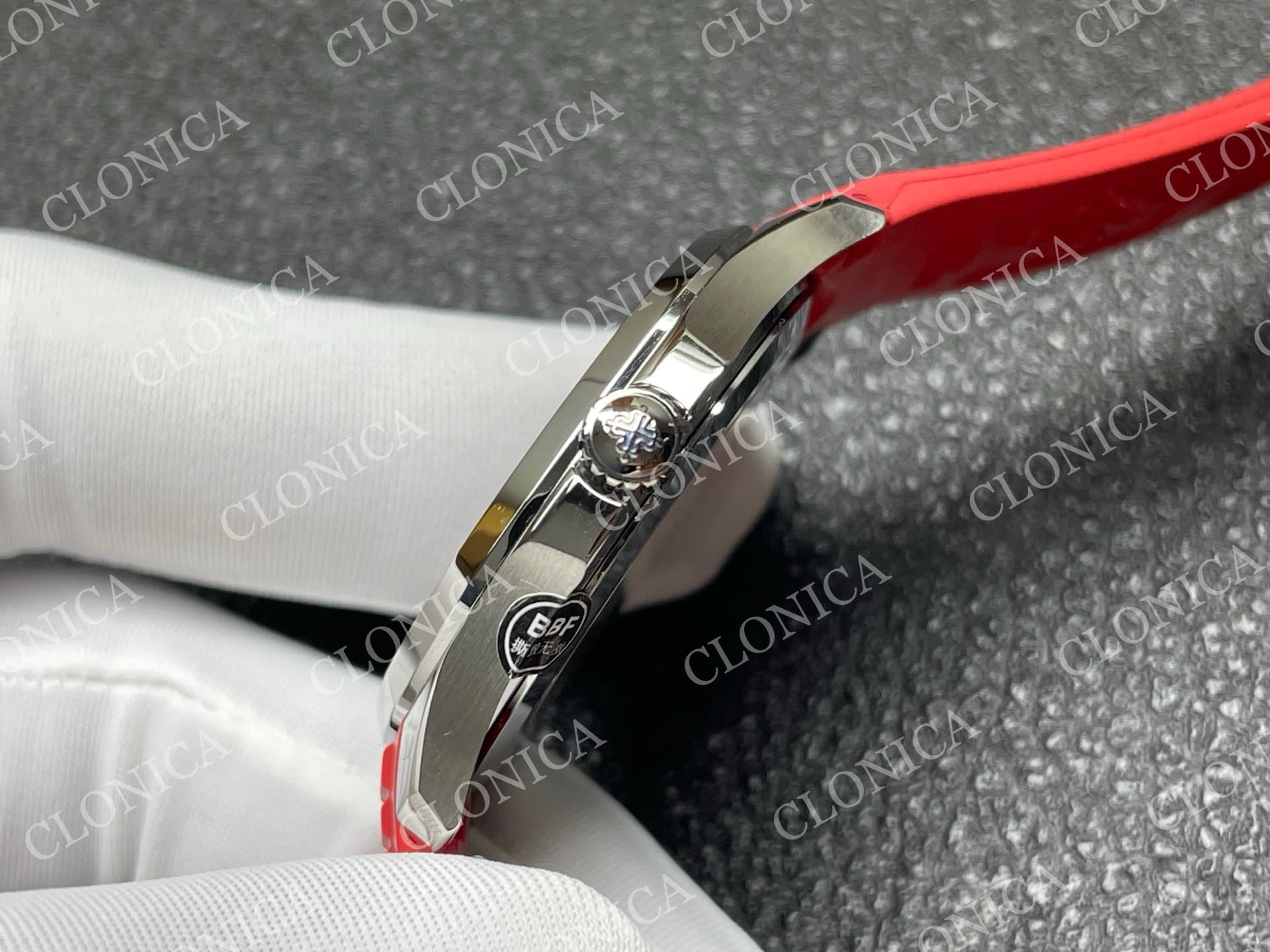 AQUANAUT 5167 SINGAPORE 2019 SS BLACK DIAL ON RED STRAP — view 7