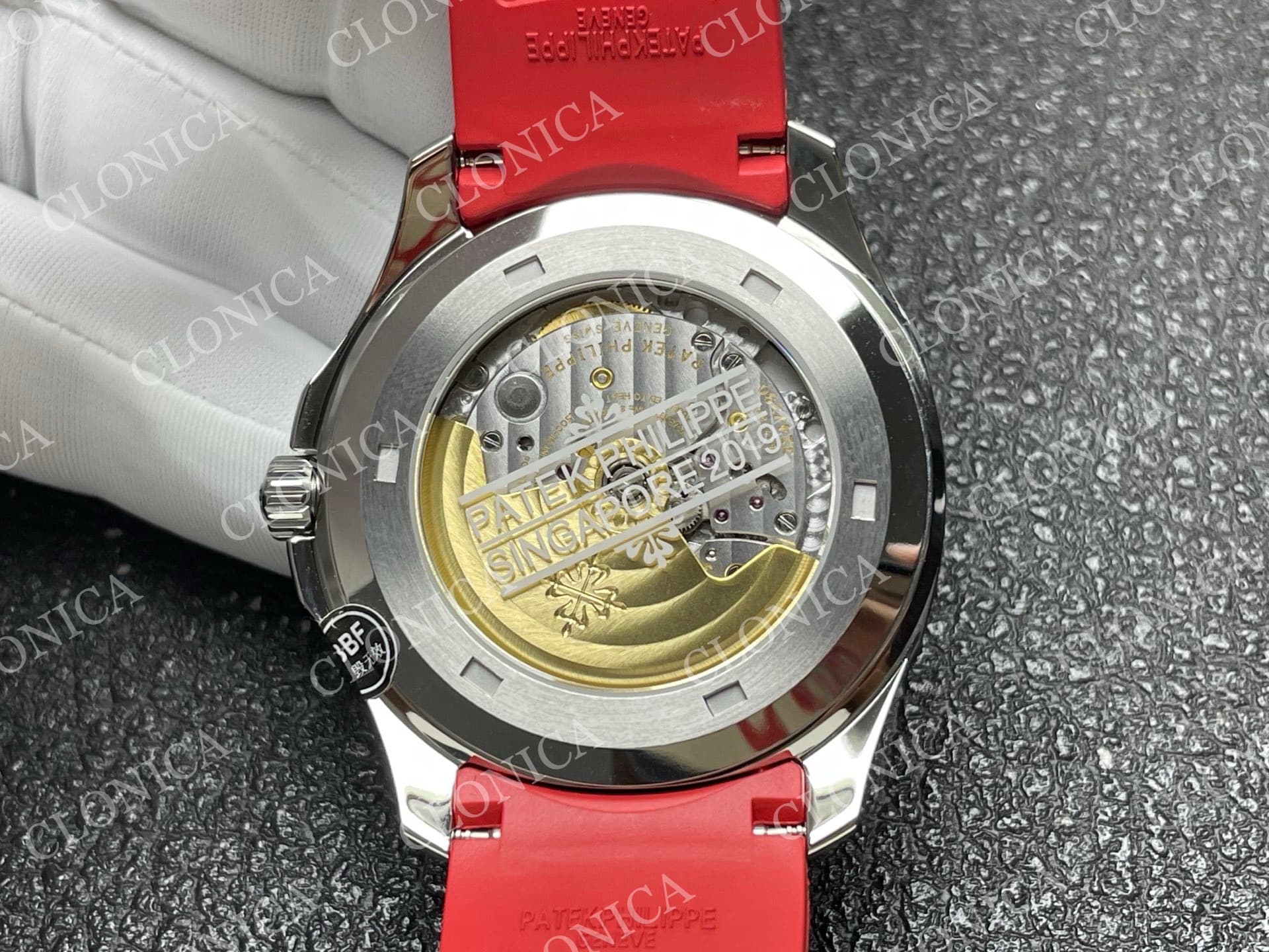 AQUANAUT 5167 SINGAPORE 2019 SS BLACK DIAL ON RED STRAP — view 8