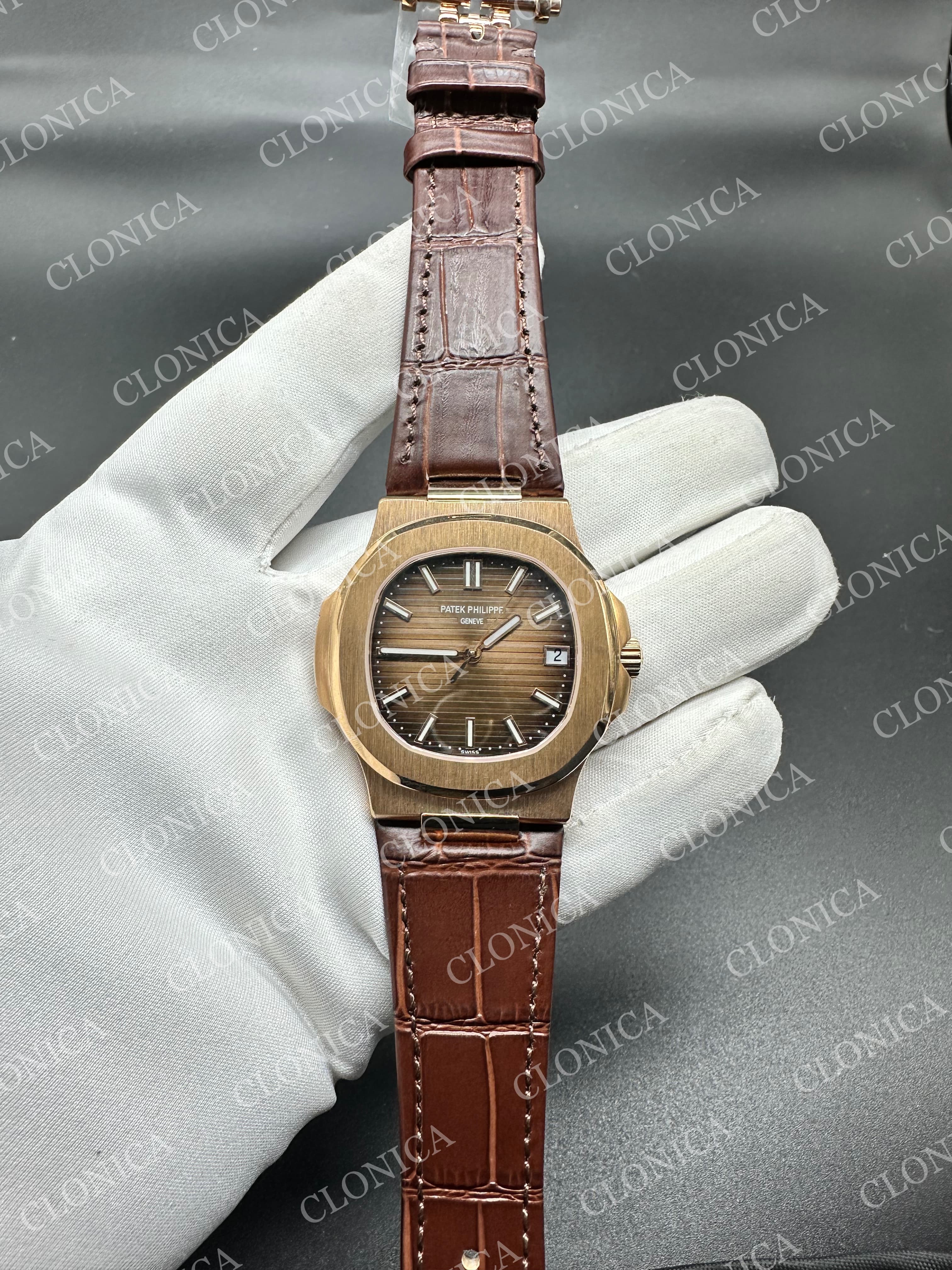 NAUTILUS 5711 BROWN TEXTURED DIAL ON BLACK LEATHER STRAP — view 1