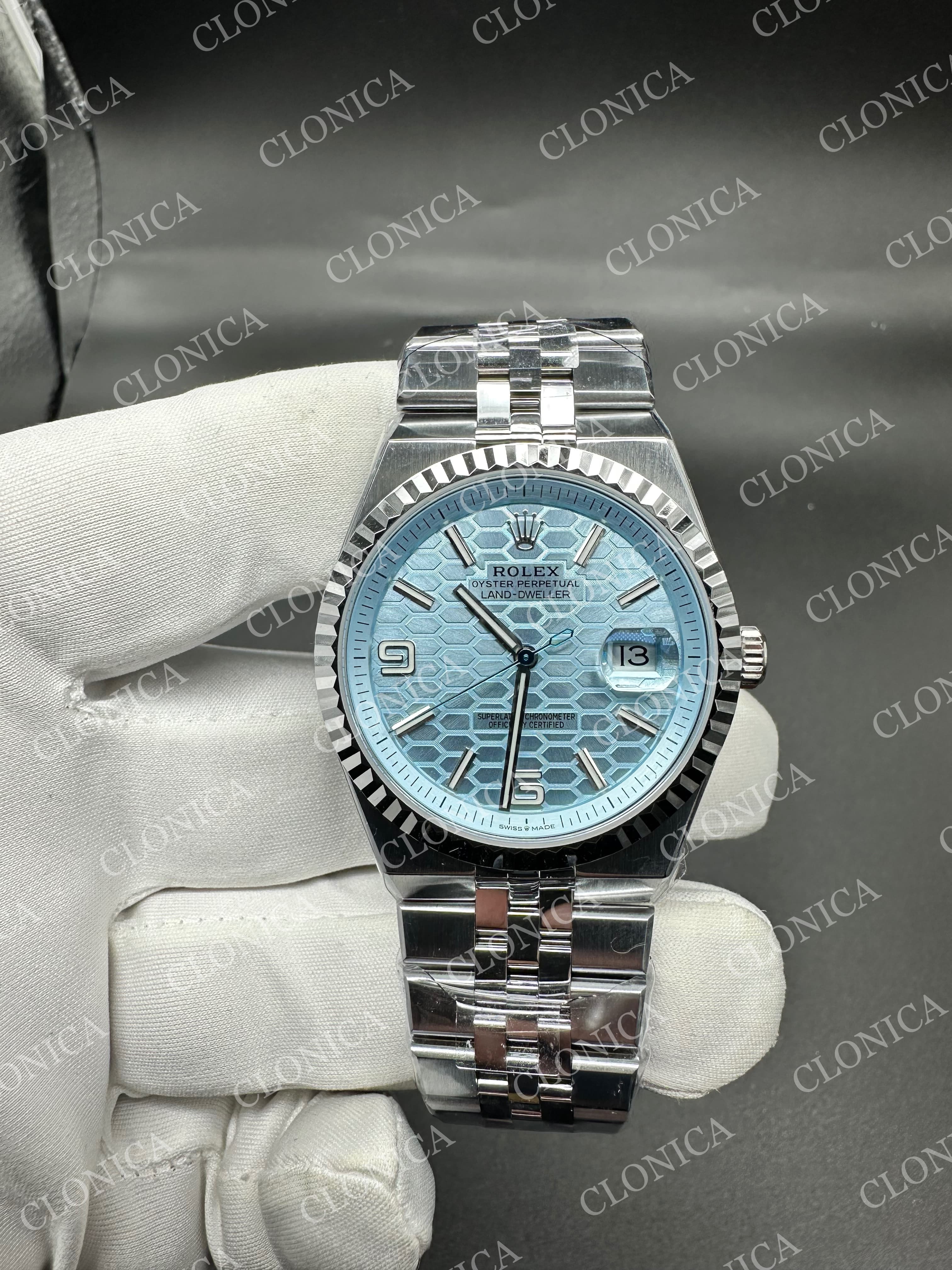 LAND DWELLER 127336 GAIN WEIGHT ICE BLUE DIAL ON SS BRACELET — view 1