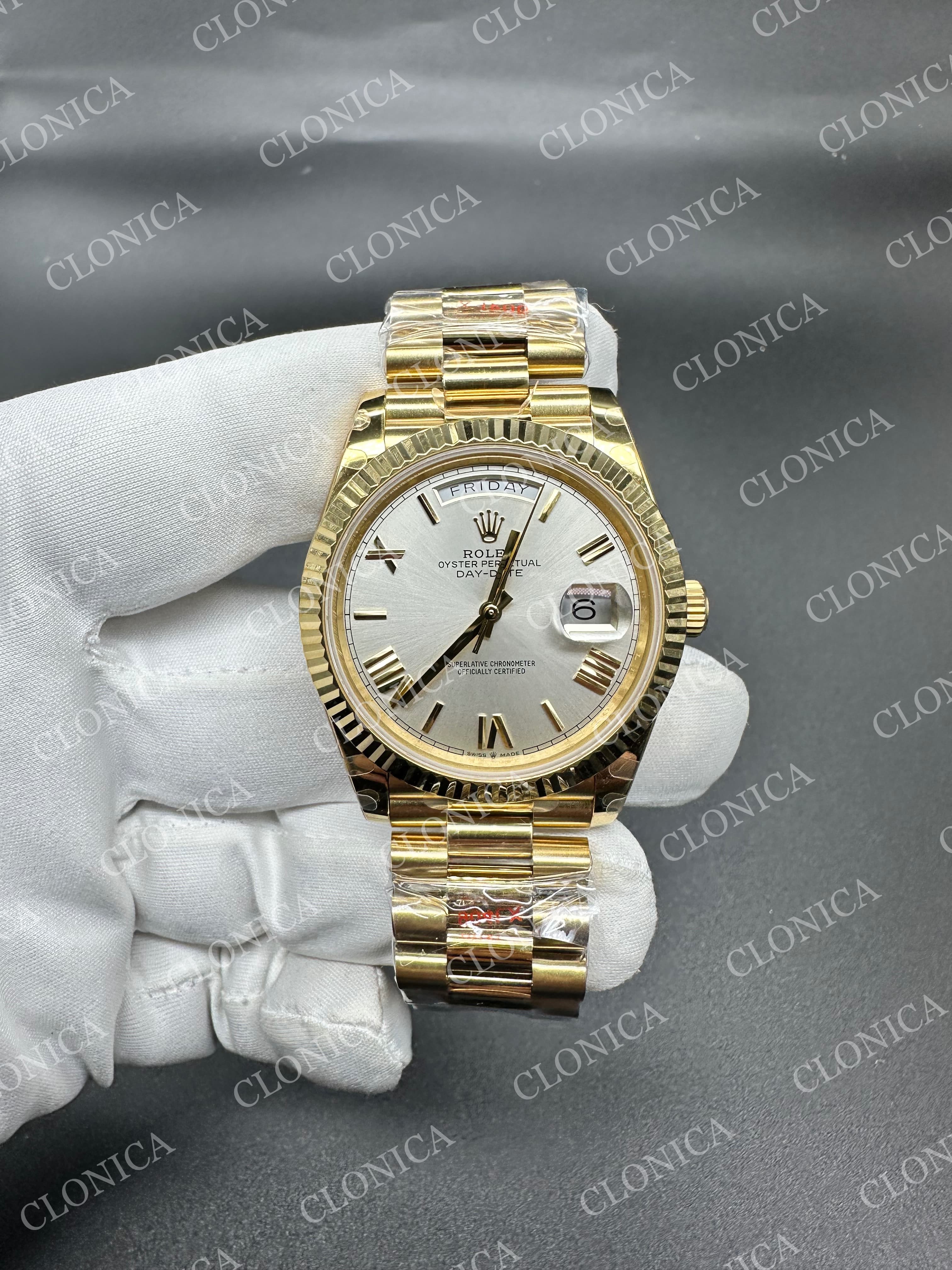 DAY DATE 228238 40MM GAIN WEIGHT SILVER DIAL ROMAN MARKER ON YG PRESIDENT BRACELET — view 1